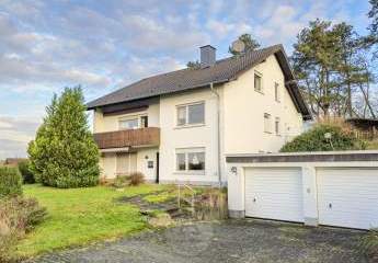 Hier wachsen Ideen: Zweifamilienhaus in Spitzenlage mit Ausbaureserve und Fernblick