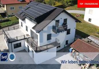 RESERVIERT!
MODERNES 3-FAMILIENHAUS MIT PV-ANLAGE