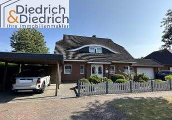 Verkauf eines komfortablen Wohnhauses im Villenstil mit Garage und Carport in ruhiger Lage in Weddingstedt