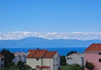 Appartement mit Meerblick + Appartement im Erdgeschoss mit Pool und Garten