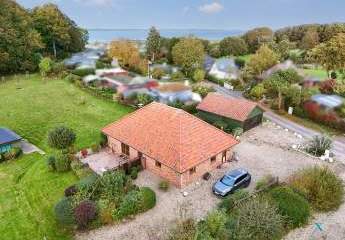 Idyllisches Landleben trifft auf Komfort – Bungalow mit Pferdekoppel in Fördenähe