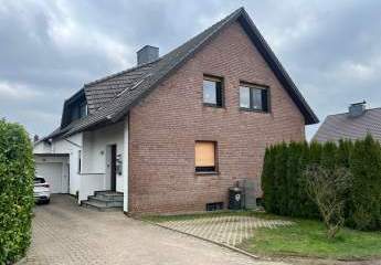 Gepflegtes Zweifamilienhaus mit Weitblick in einer ruhigen Anliegerstraße von Hüllhorst!