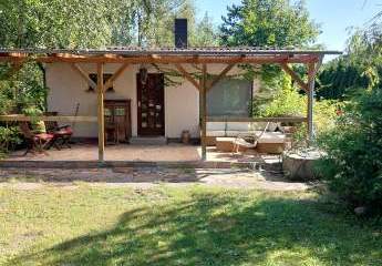 Bungalow auf Idyllischem Grundstück in zentraler Lage