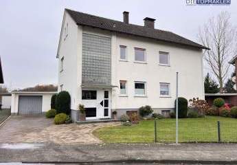 Charmantes Zweifamilienhaus mit traumhaftem Gartenblick